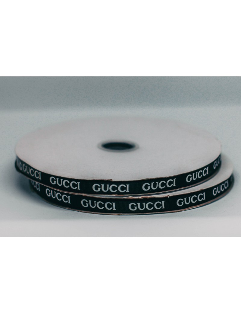 Лента стропа GUCCI  4 см в упак1 метраж100  арт 7715 черный белые буквы